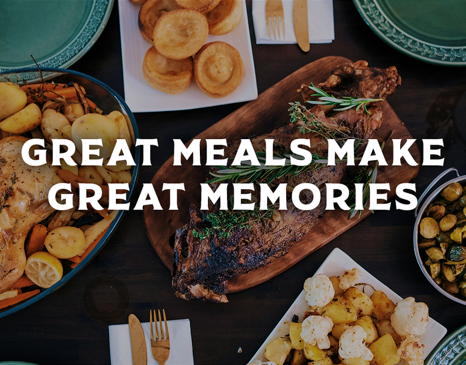 Dinner table with roasted meat, vegetables, and bread with text 'Great meals make great memories'.