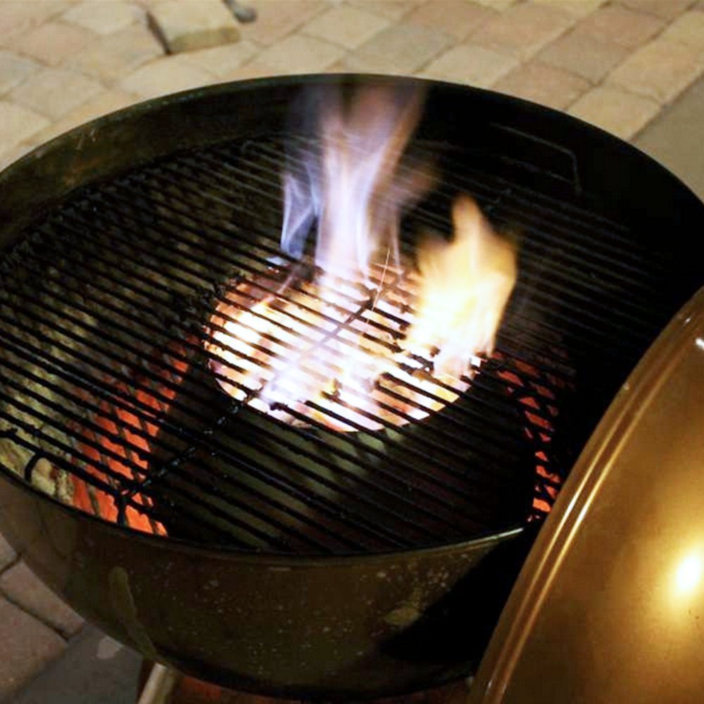 Close-up of the vent holes and textured surface of the large BBQ Vortex, highlighting its durable steel construction and