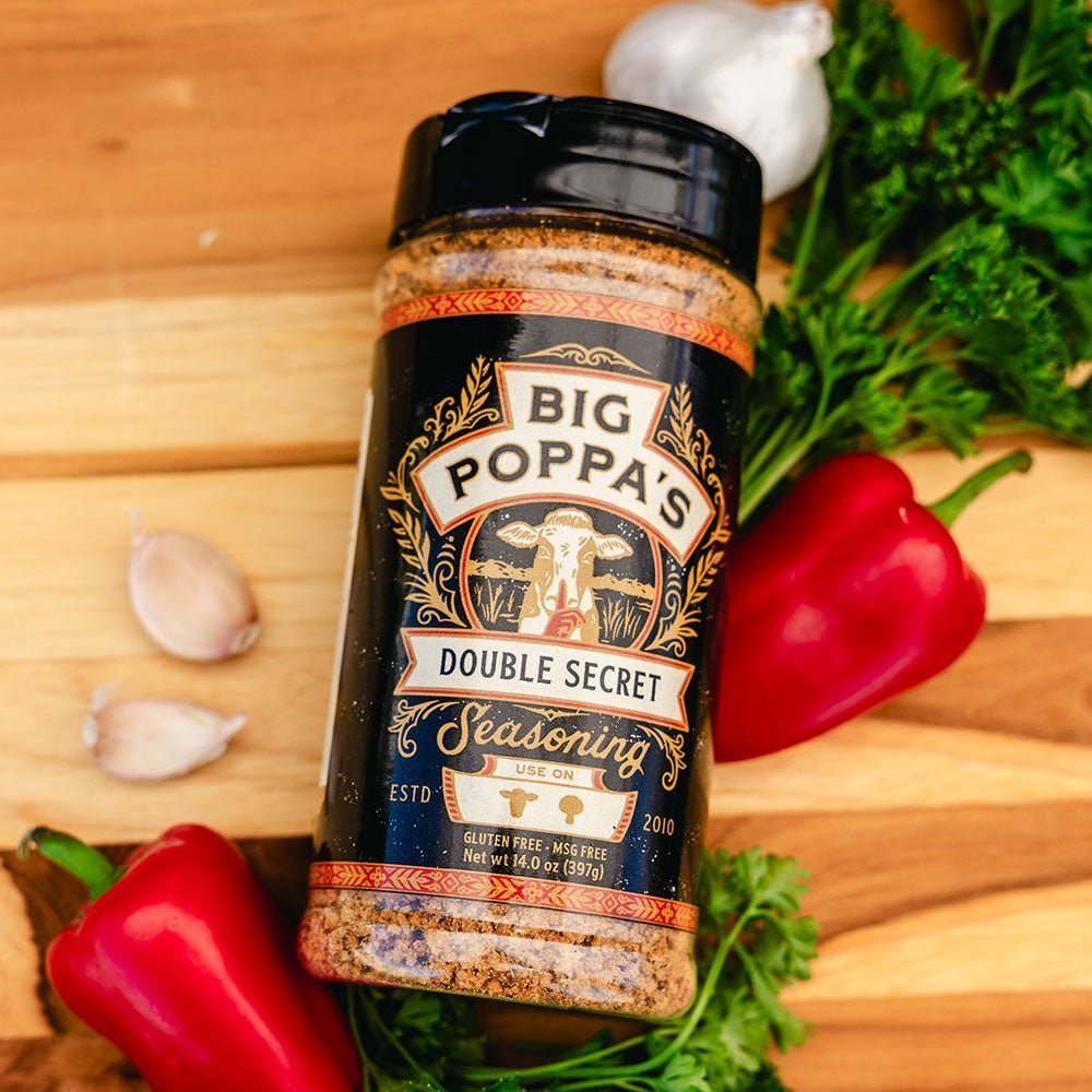 Close-up of Big Poppa's Double Secret Seasoning 14oz label highlighting handcrafted ingredients and rustic font detail