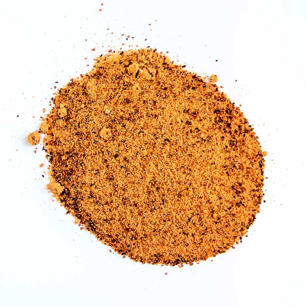 Close-up of Big Poppa's Little Louie's Garlic Pepper seasoning label highlighting ingredient list and handcrafted details