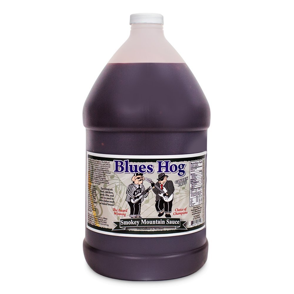 Blues Hog Smokey Mountain BBQ Sauce gallon size in clear plastic container with red and black label, thick dark sauce