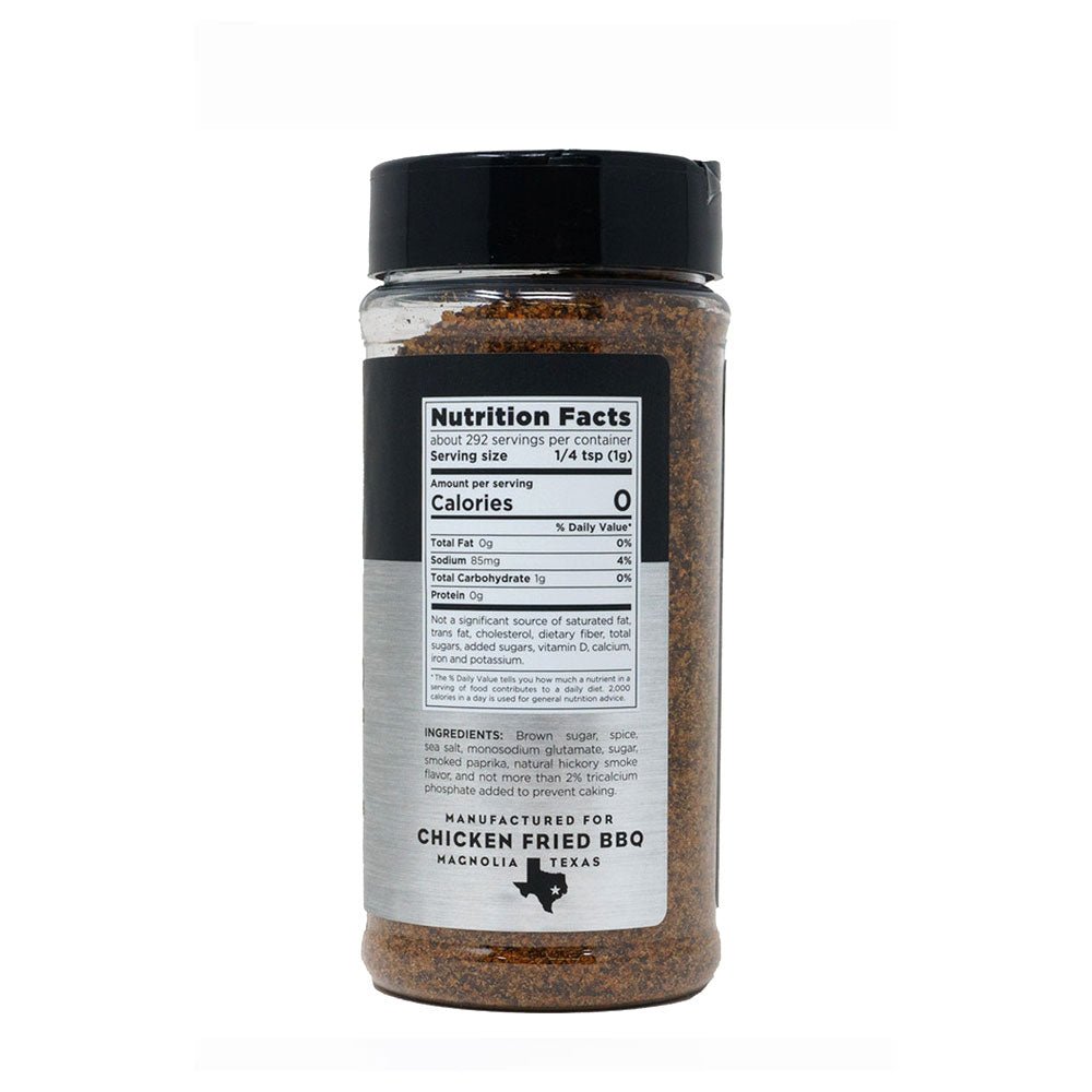 Close-up of the Chicken Fried BBQ Texas Rib Grind 11oz label highlighting hand-crafted, farm-raised ingredients on textured