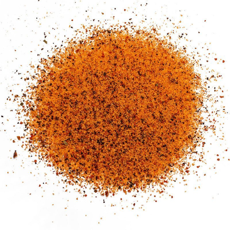 Close-up of EAT Barbecue Sweetness Rub label highlighting handcrafted ingredients and farm-raised sourcing details