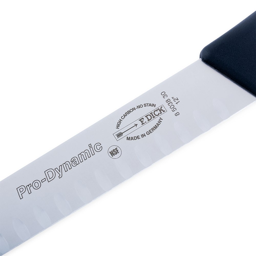 Close-up of the 12-inch hollow ground blade edge highlighting its seamless construction and polished, reflective surface.