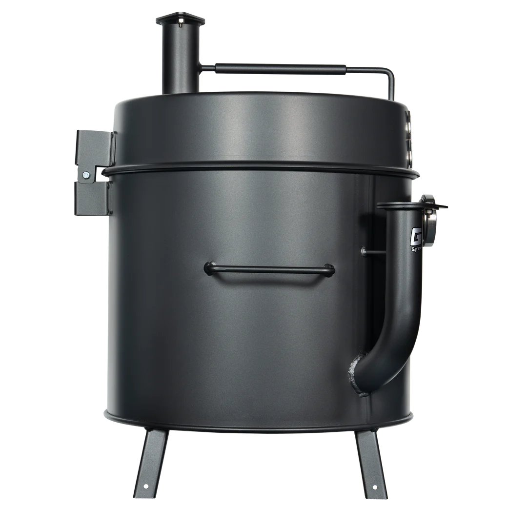Close-up of the Gateway Mini Go2 Drum Smoker’s black textured steel lid handle and silver latch detail at an angled corner