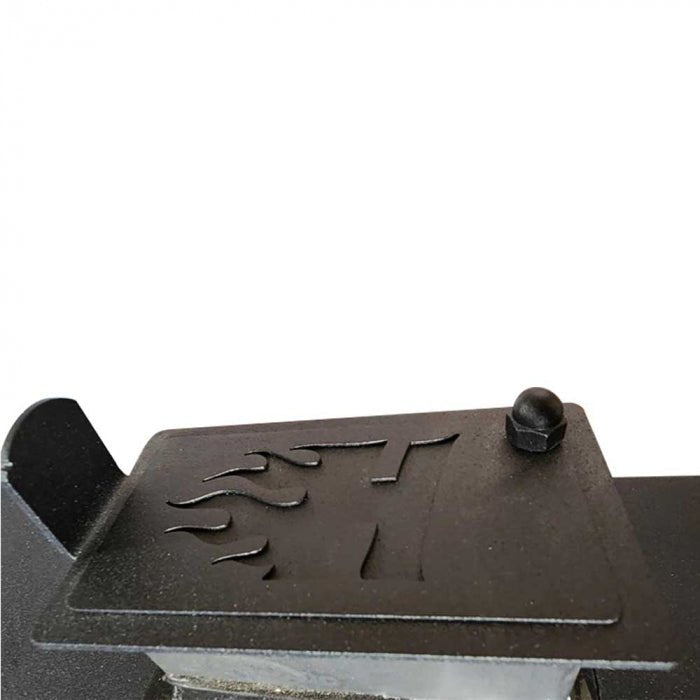 Close-up of Humphrey's Down East Beast smoker’s black matte textured steel body with visible cooling vents and engraved logo