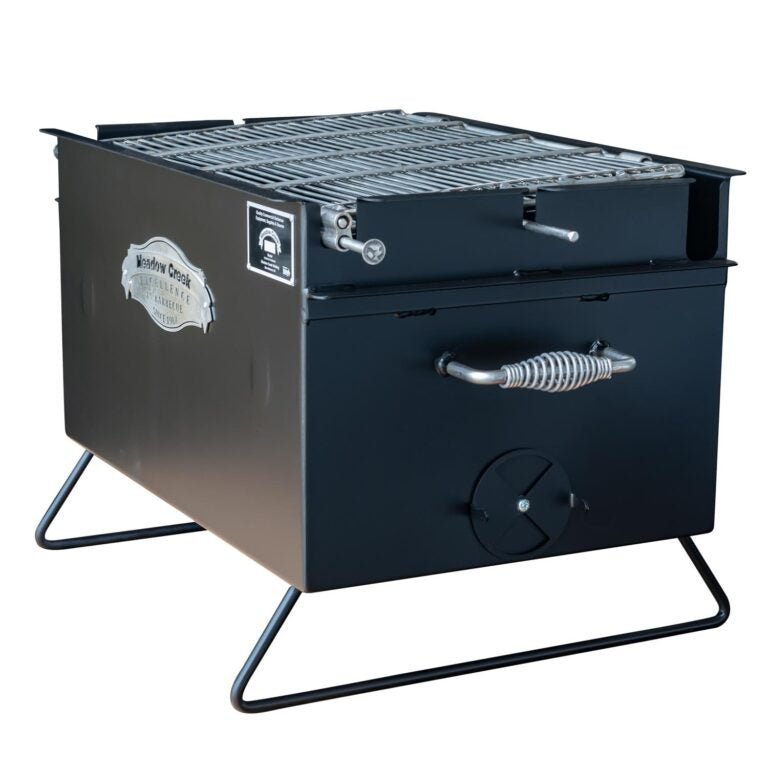 Close-up of the Meadow Creek BBQ26 Chicken Cooker’s textured stainless steel lid handle with engraved logo detail.