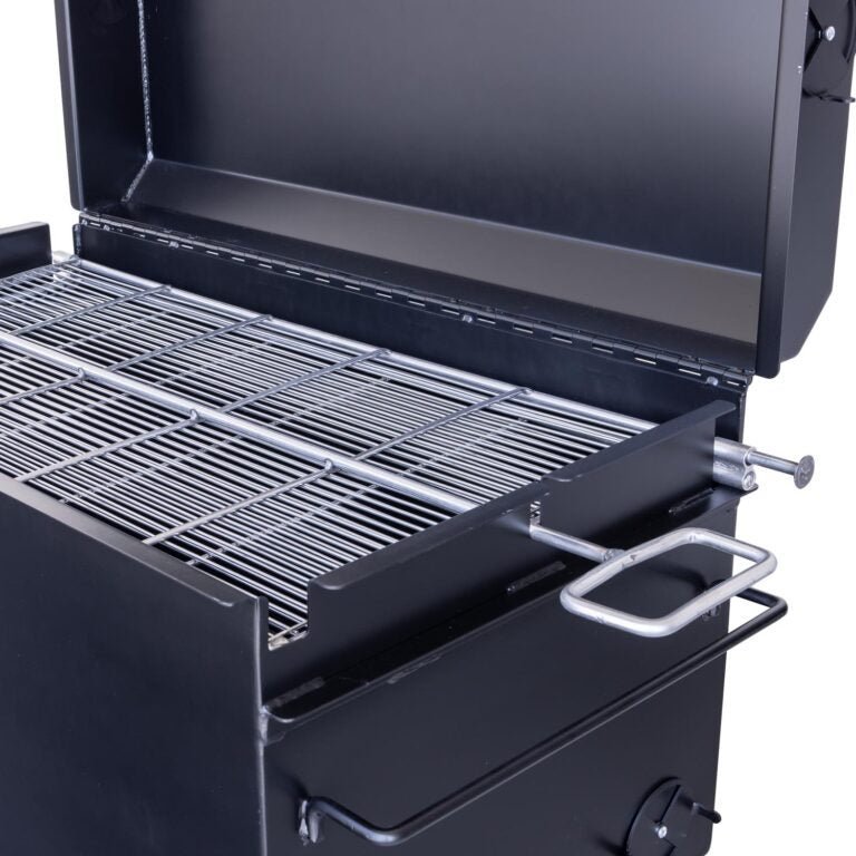 Close-up of the Meadow Creek BBQ42 Chicken Cooker’s stainless steel lid handle with textured grip and latch mechanism