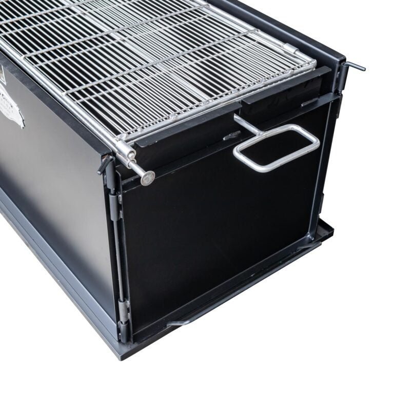 Close-up of the black, heat-resistant silicone handle with textured grip on the collapsible chicken cooker lid