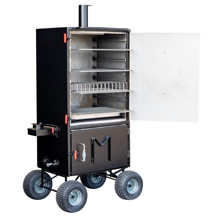 Close-up of the Meadow Creek BX50 Cabinet Smoker’s stainless steel interior door latch and textured handle detail.