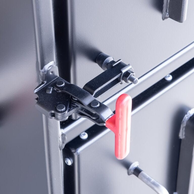 Close-up of the Meadow Creek BX50 Cabinet Smoker's stainless steel control panel with temperature dials and silver finish.