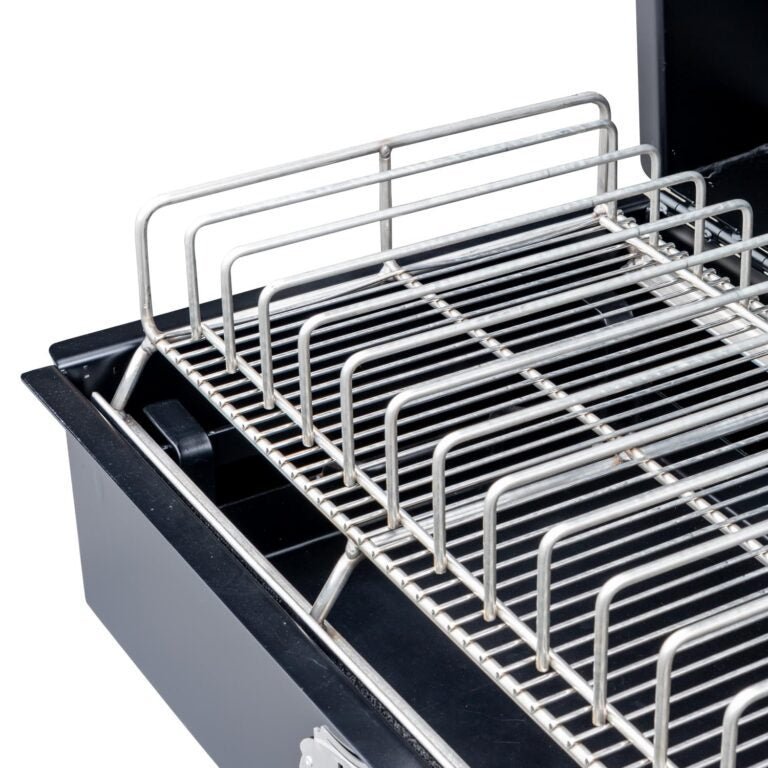 Close-up of the sturdy stainless steel ring handle and textured surface on the Meadow Creek PR36 Pig Roaster’s lid for easy