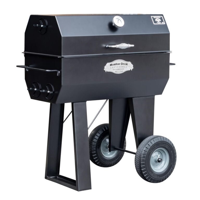Close-up of the stout stainless steel rotisserie spit with adjustable locking mechanism and textured surface for secure