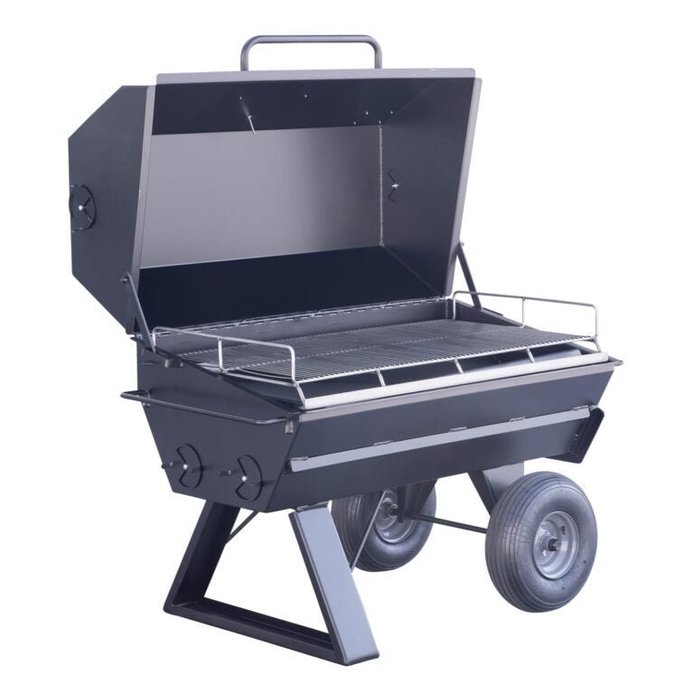 Close-up of the heavy-duty stainless steel cooking grate with textured surface and welded edges on the Meadow Creek PR42 Pig