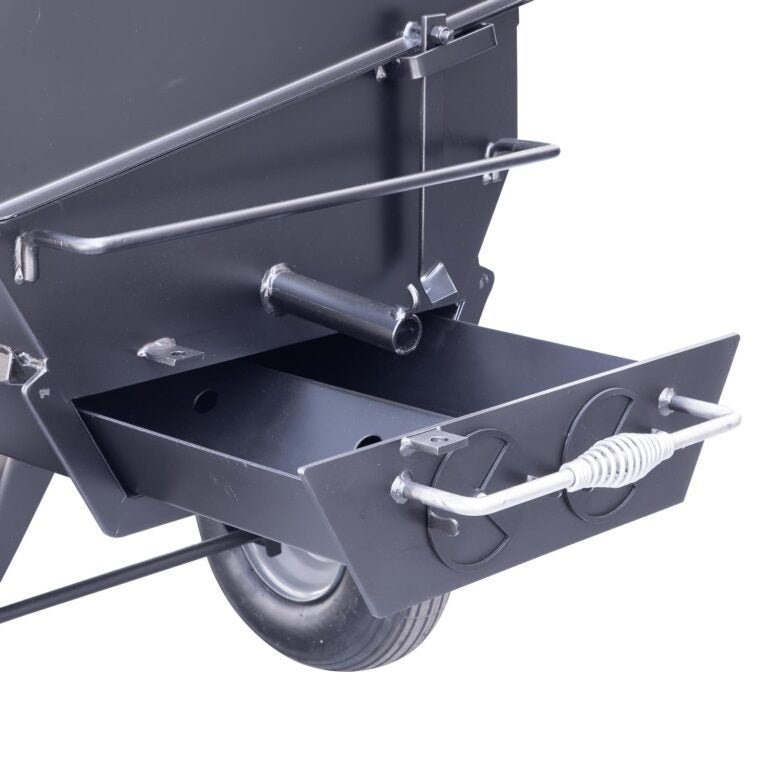Close-up of the 42-inch stainless steel cooking grate with textured surface and adjustable height latch on Meadow Creek PR42
