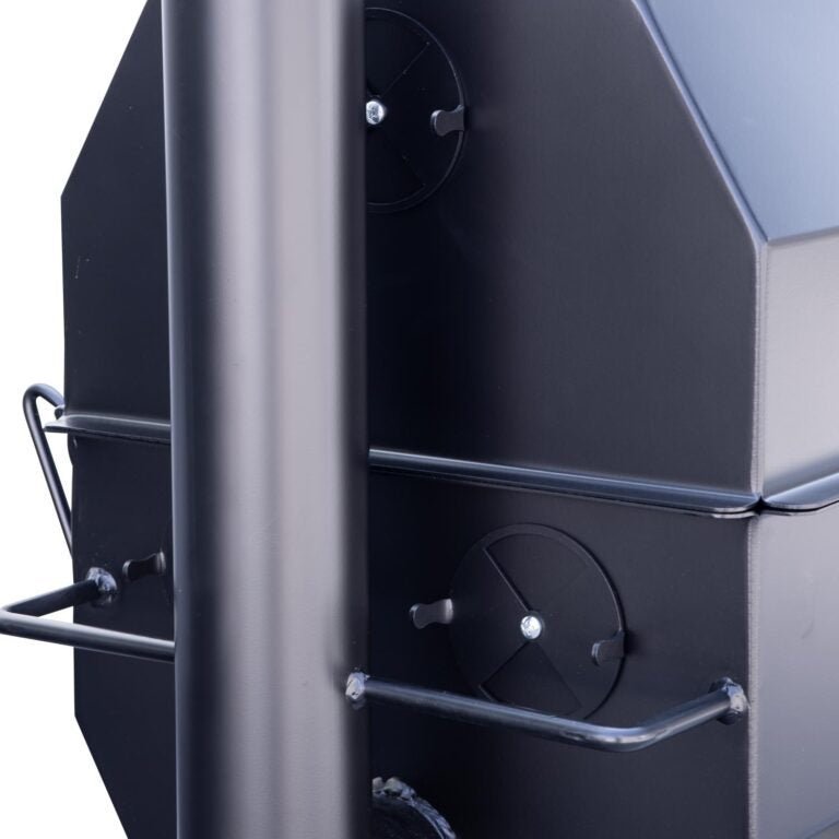 Close-up of the black powder-coated steel lid latch and textured surface on the Meadow Creek SQ36 Offset BBQ Smoker side