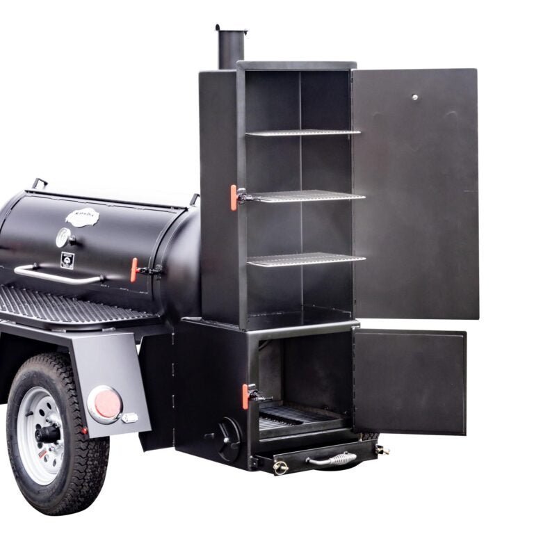 Close-up of the textured, black powder-coated steel surface on the rear corner of the Meadow Creek TS120 smoker trailer with