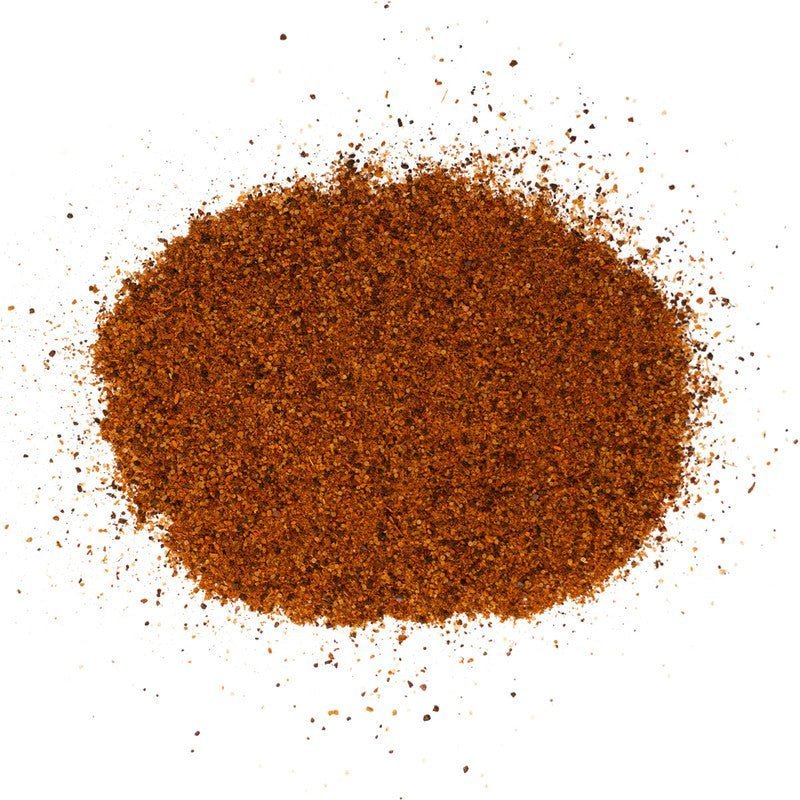 Close-up of the Meat Church Texas Chili Seasoning label highlighting handcrafted ingredients on an 8oz spice jar.