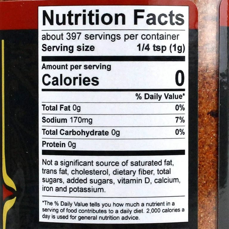 Close-up of the 14oz Plowboys BBQ Yardbird Rub jar label highlighting ingredients and bold orange design detail