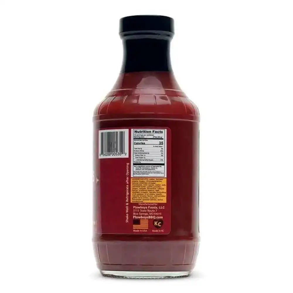 Close-up of the Plowboys KC Crossroads BBQ Sauce 19oz label highlighting hand-crafted ingredients and bold branding detail.