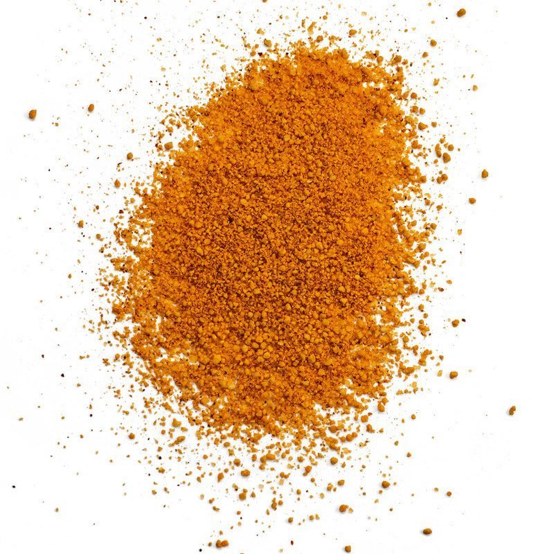 Close-up of the 5lb bag's textured seasoning blend and vibrant label detailing organic, hand-crafted ingredients for grilling