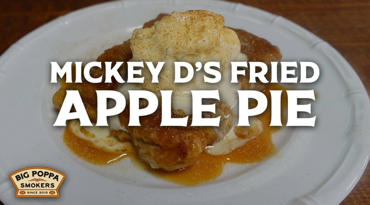 Fried apple pie topped with vanilla ice cream, caramel sauce, and a dusting of cinnamon.