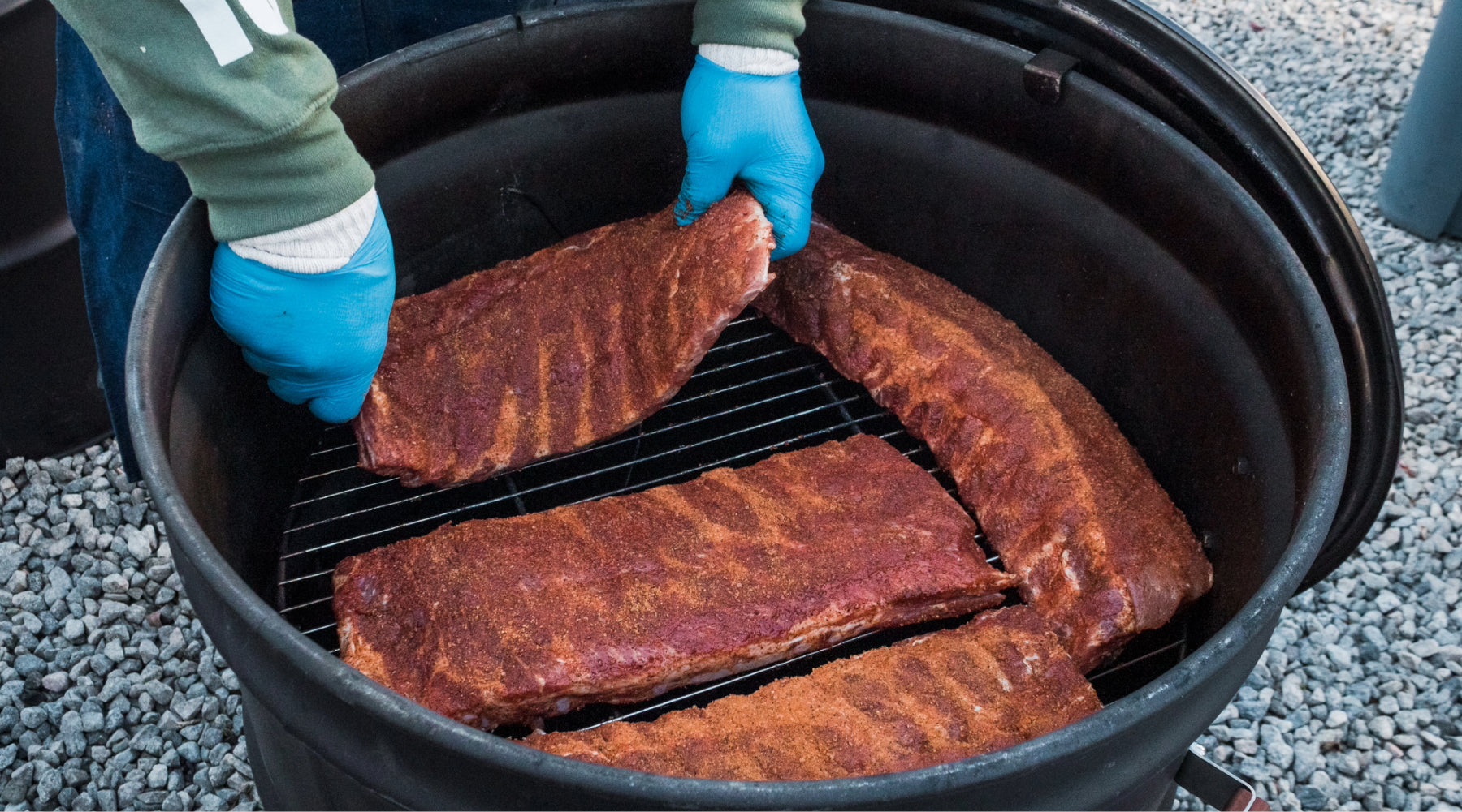 Smoking ribs in the drum smoker for bbq season