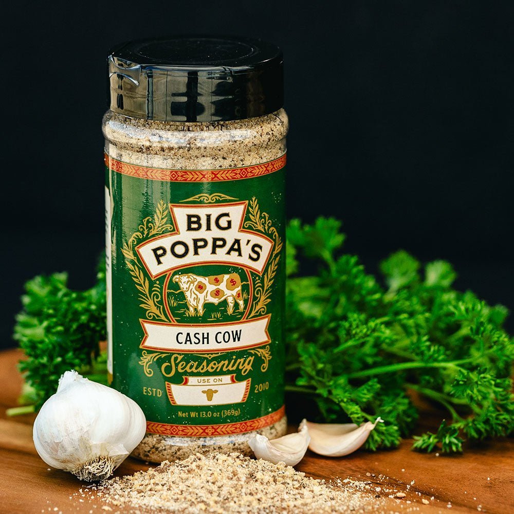 Close-up of Big Poppa's Cash Cow Seasoning 13oz label highlighting handcrafted, locally-sourced ingredients and vibrant