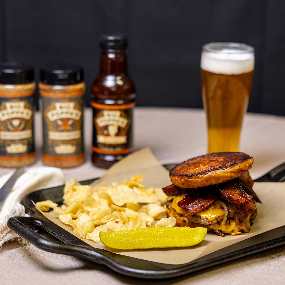 Close-up of the 13.4oz seasoning case front label highlighting handcrafted ingredients and bold branding details.