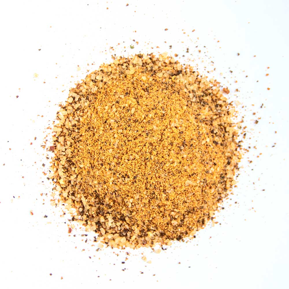 Close-up of Big Poppa's Double Secret Seasoning 14oz label highlighting natural ingredients and handcrafted design