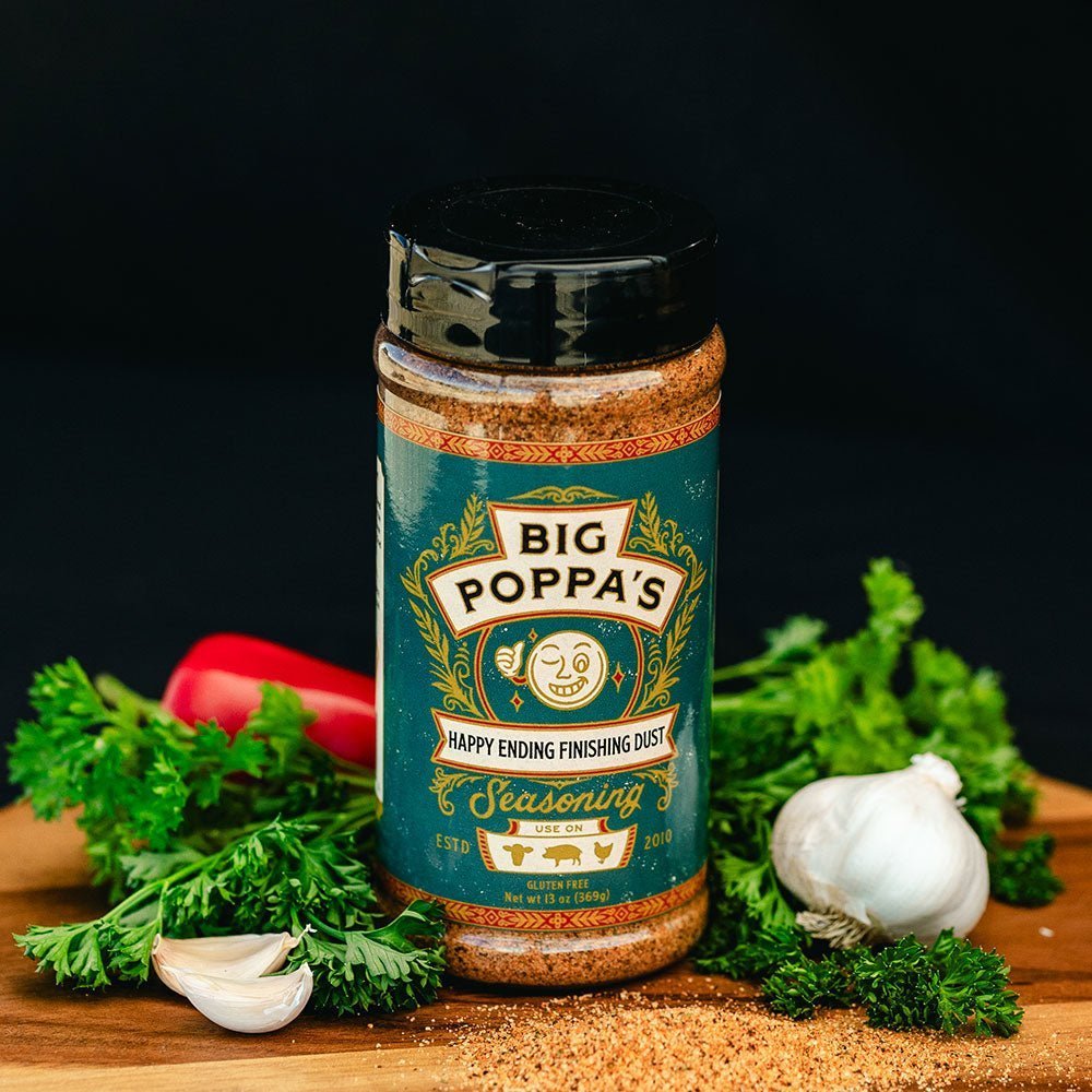 Close-up of Big Poppa's Happy Ending Finishing Dust seasoning container, highlighting the textured, hand-crafted label