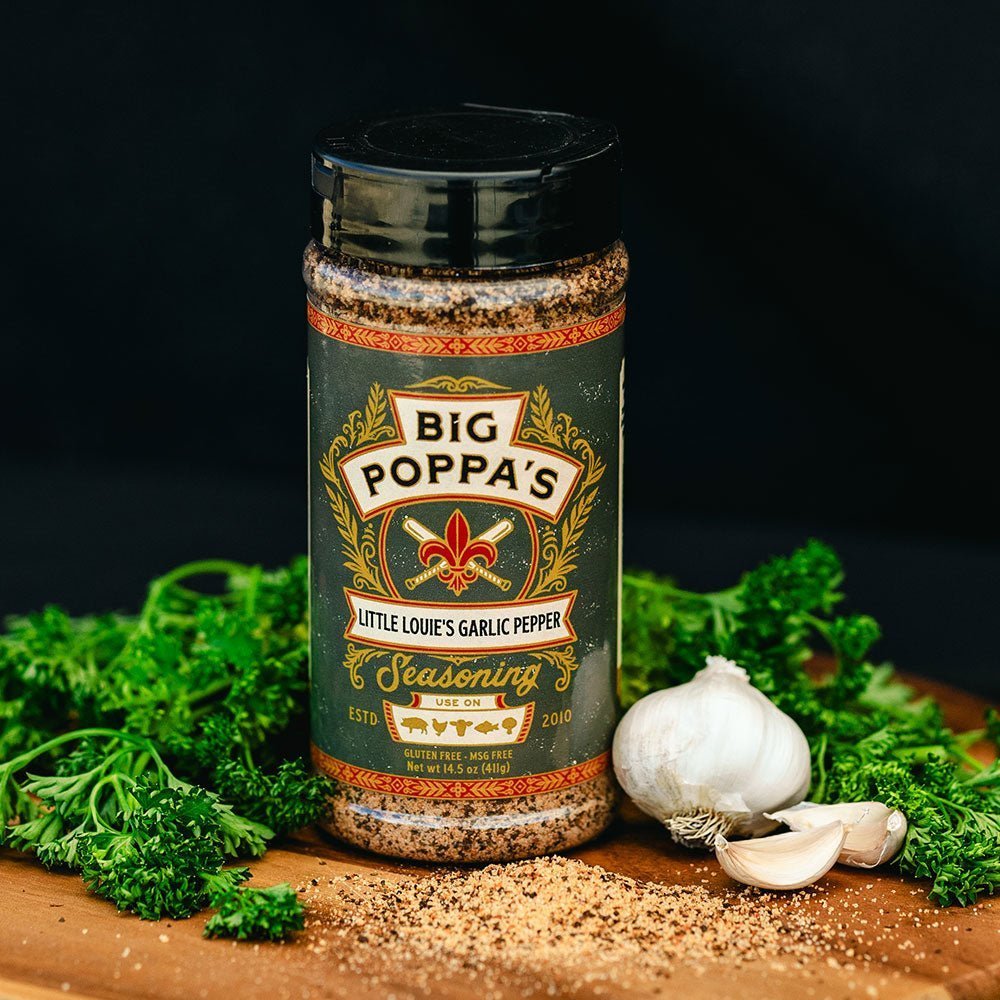 Close-up of Big Poppa's Little Louie's Garlic Pepper Seasoning container showing textured seasoning blend and clear label