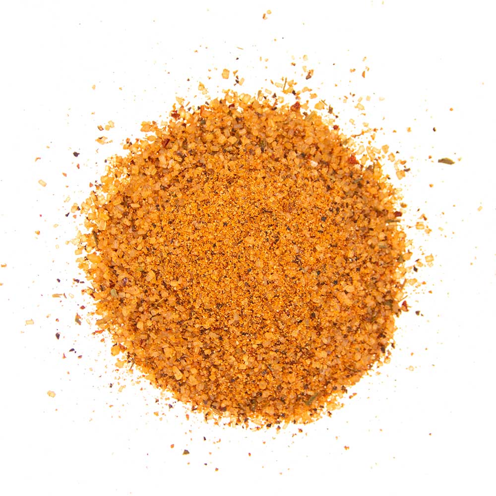 Close-up of Big Poppa's Money Seasoning 14oz label highlighting hand-crafted, locally-sourced ingredients on textured