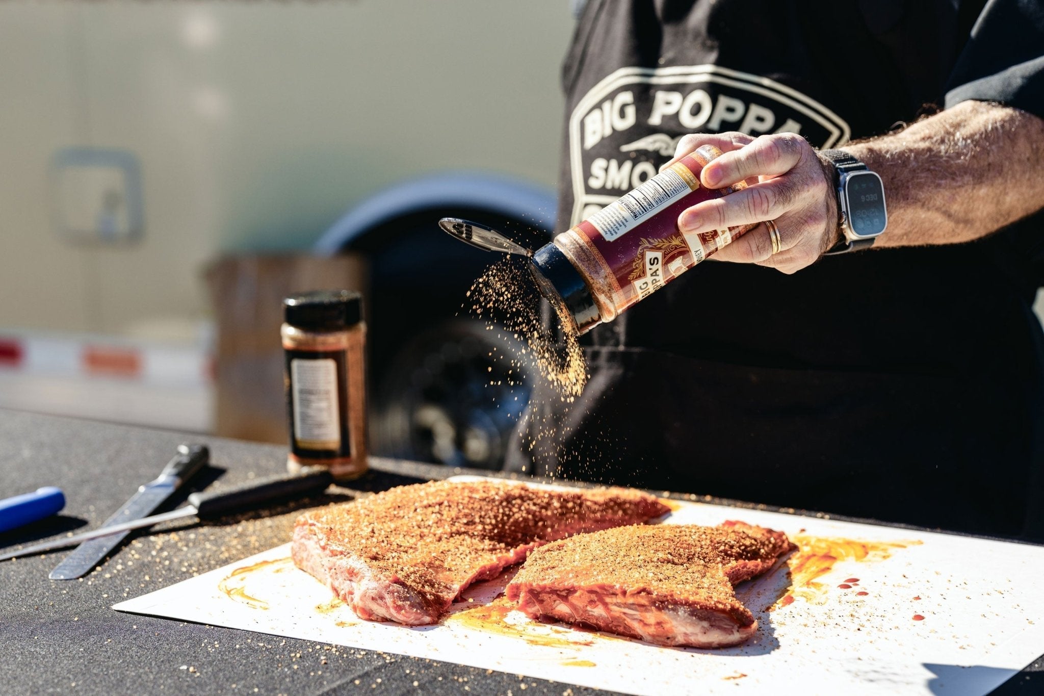 Close-up of Big Poppa's Money Seasoning 5lb bag showing textured, hand-crafted seasoning grains and detailed label design.