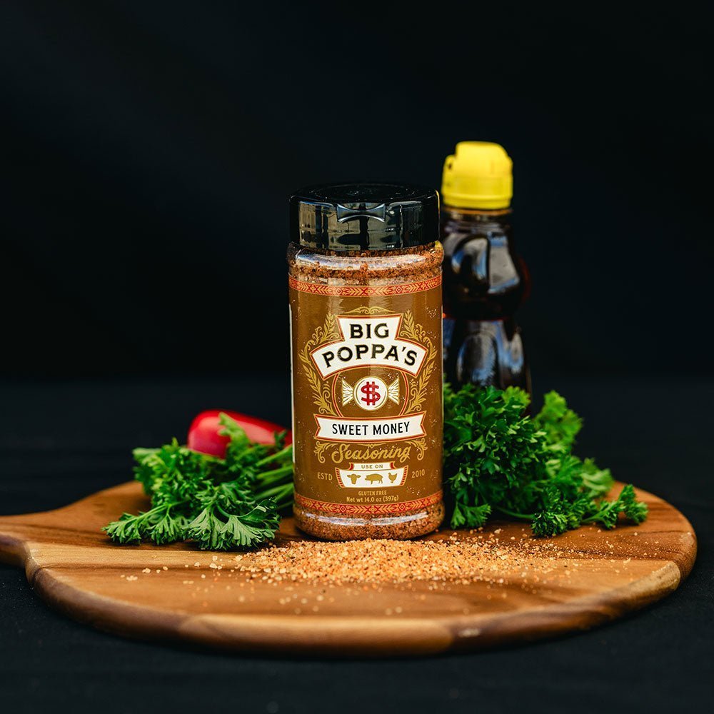 Close-up of Big Poppa's Sweet Money Seasoning logo on the 5lb bag’s textured paper packaging with visible seasoning specks