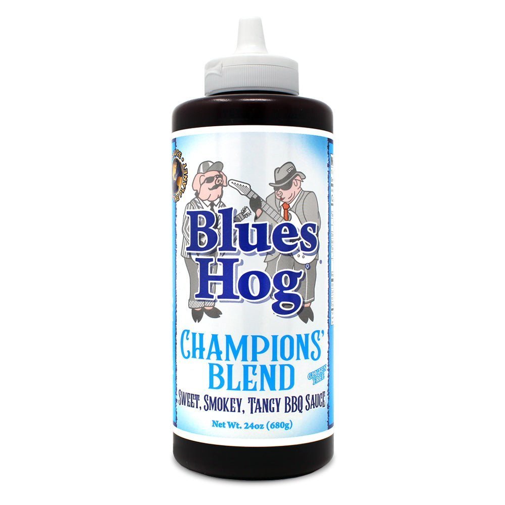 Blues Hog Champions’ Blend BBQ Sauce in clear squeeze bottle with rich dark glaze and vibrant label, suitable for beef