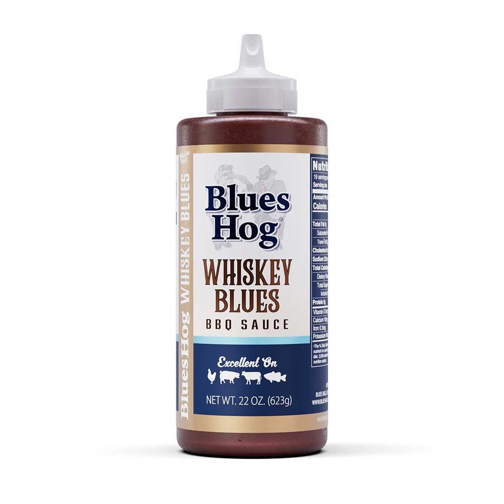 Blues Hog Whiskey Blues BBQ Sauce in squeeze bottle with rich dark color and smooth texture, crafted for beef, pork