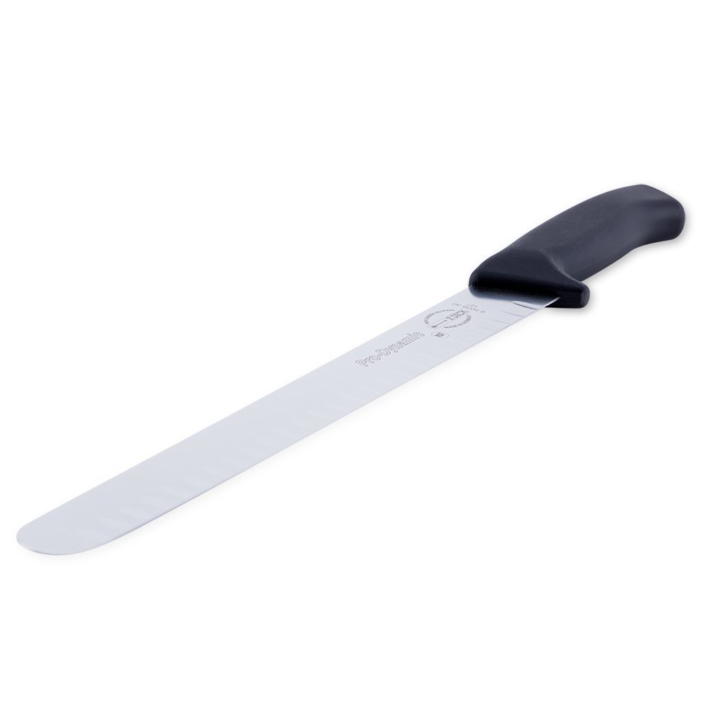 Close-up of the 12" hollow ground blade edge showcasing precise, smooth slicing surface with visible fine grind texture from
