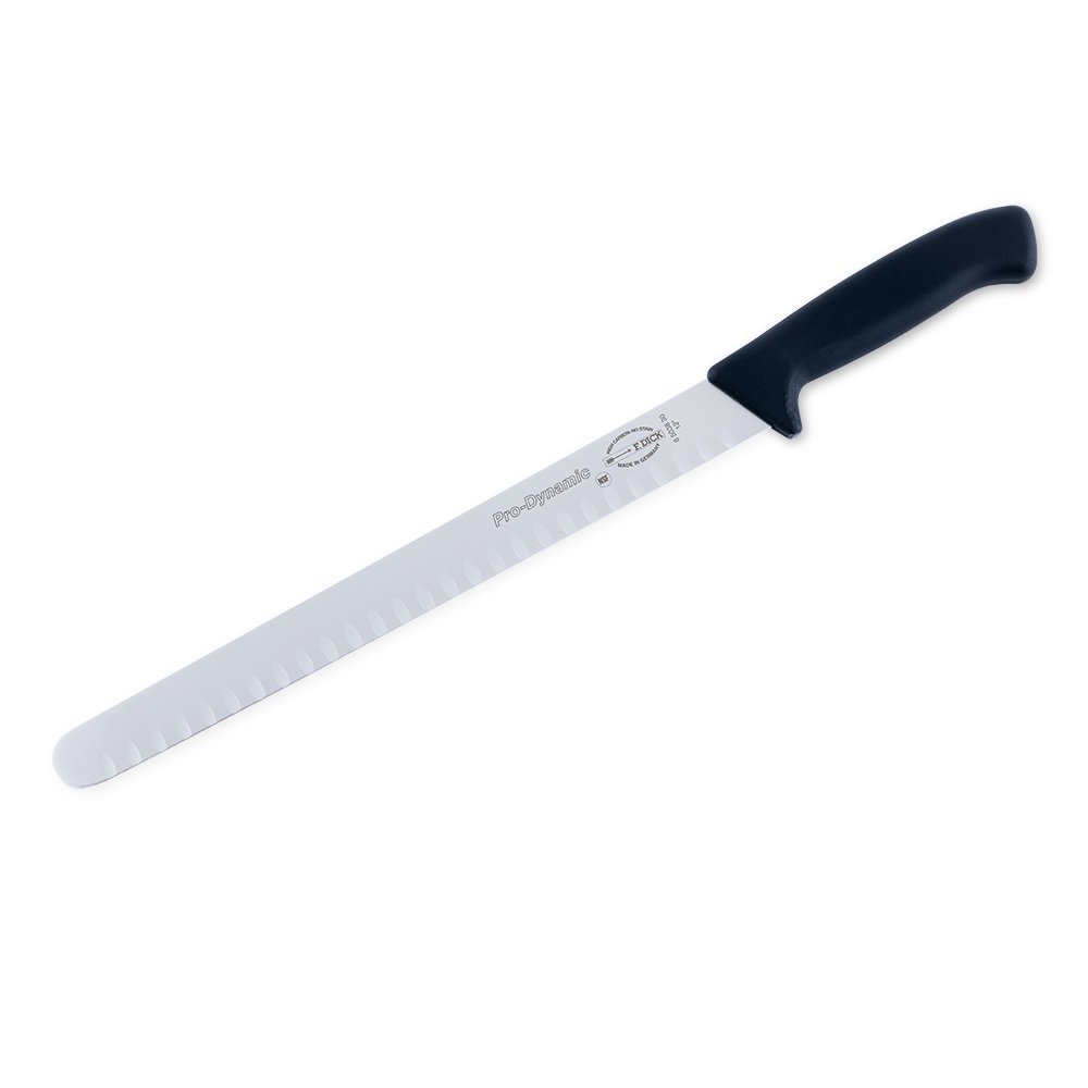 Close-up of the 12-inch seamless hollow ground slicer blade's textured edge detail and polished finish from an angled side