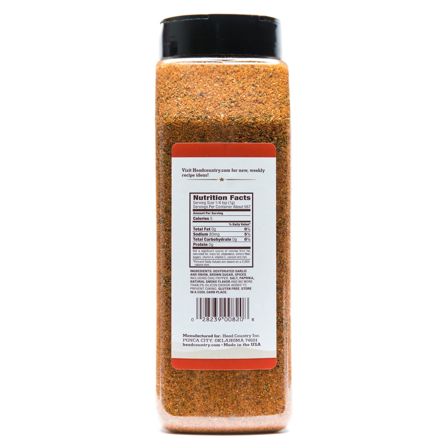Close-up of the Head Country Championship Seasoning 26oz jar showing textured seasoning grains and vibrant label detail from