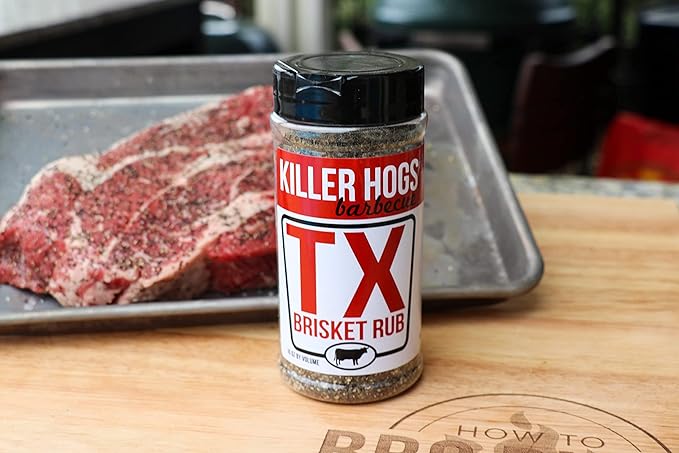 Close-up of the 11oz Killer Hogs TX Brisket Rub label showcasing textured lettering and detailed ingredient list on the