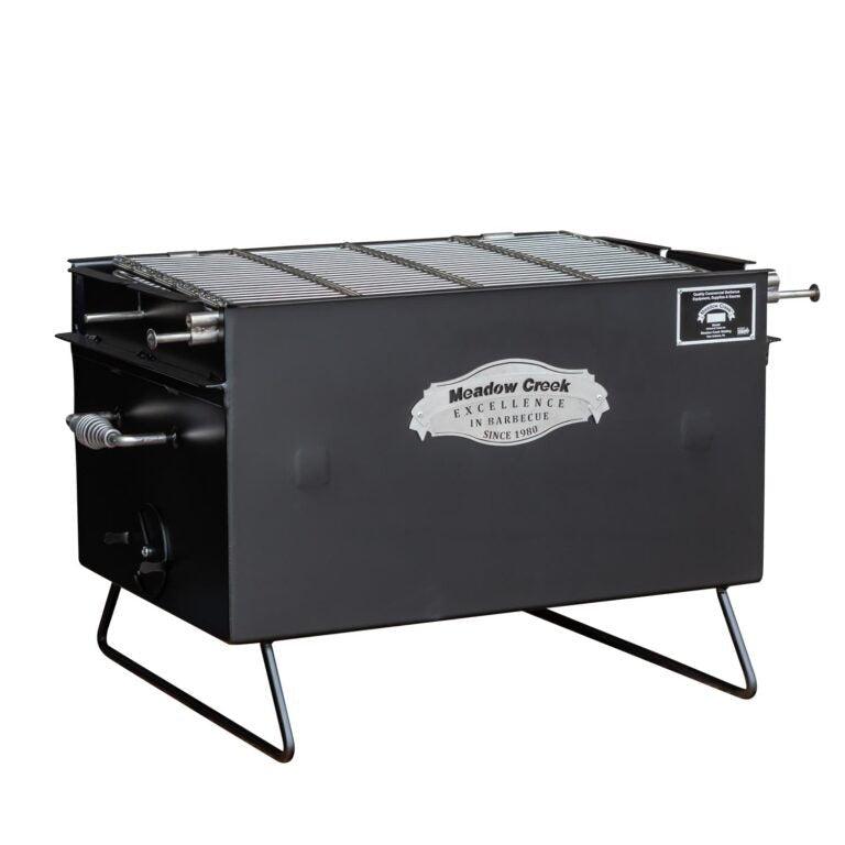 Close-up of the Meadow Creek BBQ26 Chicken Cooker’s stainless steel lid handle and textured surface at a slight angle