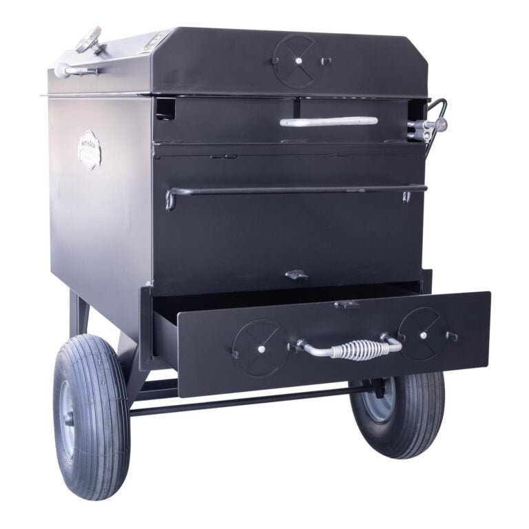 Close-up of the Meadow Creek BBQ42 chicken cooker’s stainless steel lid handle and textured surface highlighting durability