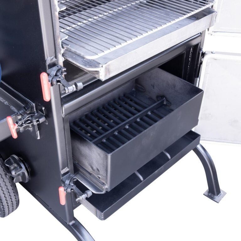 Close-up of the Meadow Creek BX25 Cabinet Smoker's stainless steel latch and handle, highlighting textured surface and