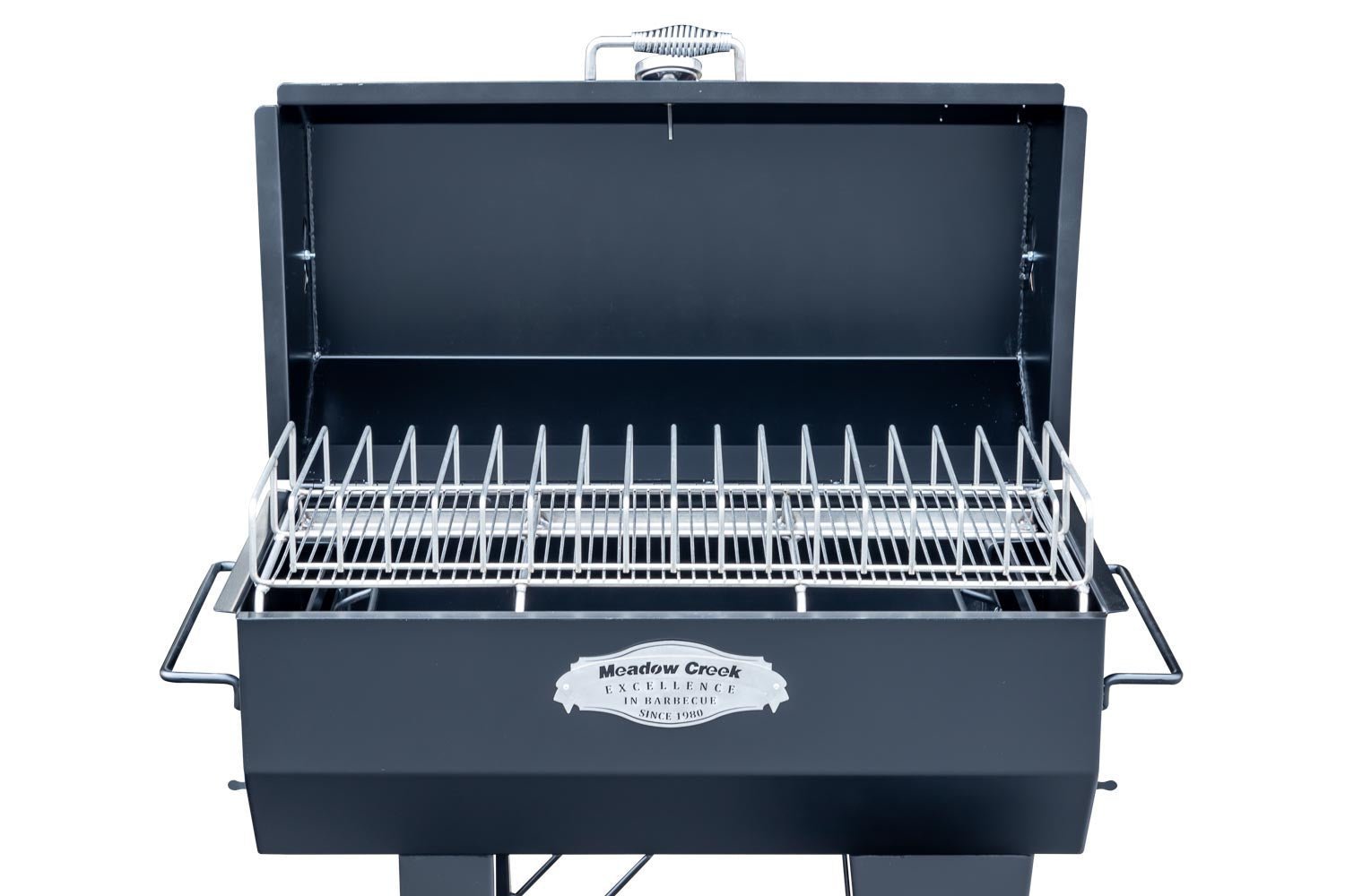 Close-up of the polished stainless steel lid latch and textured surface on the Meadow Creek PR36 Pig Roaster, highlighting