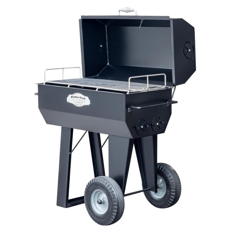 Close-up of the Meadow Creek PR36 Pig Roaster’s heavy-duty stainless steel rotation mechanism and handle for easy