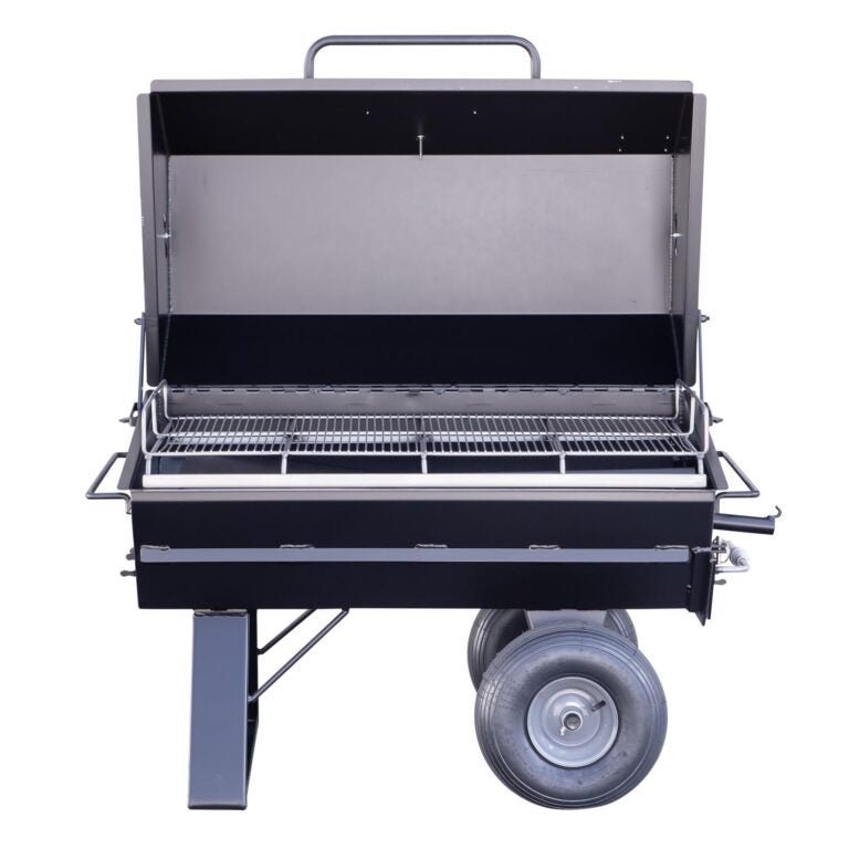 Close-up of the cast iron cooking grate with textured surface and visible rust-resistant coating on the Meadow Creek PR42