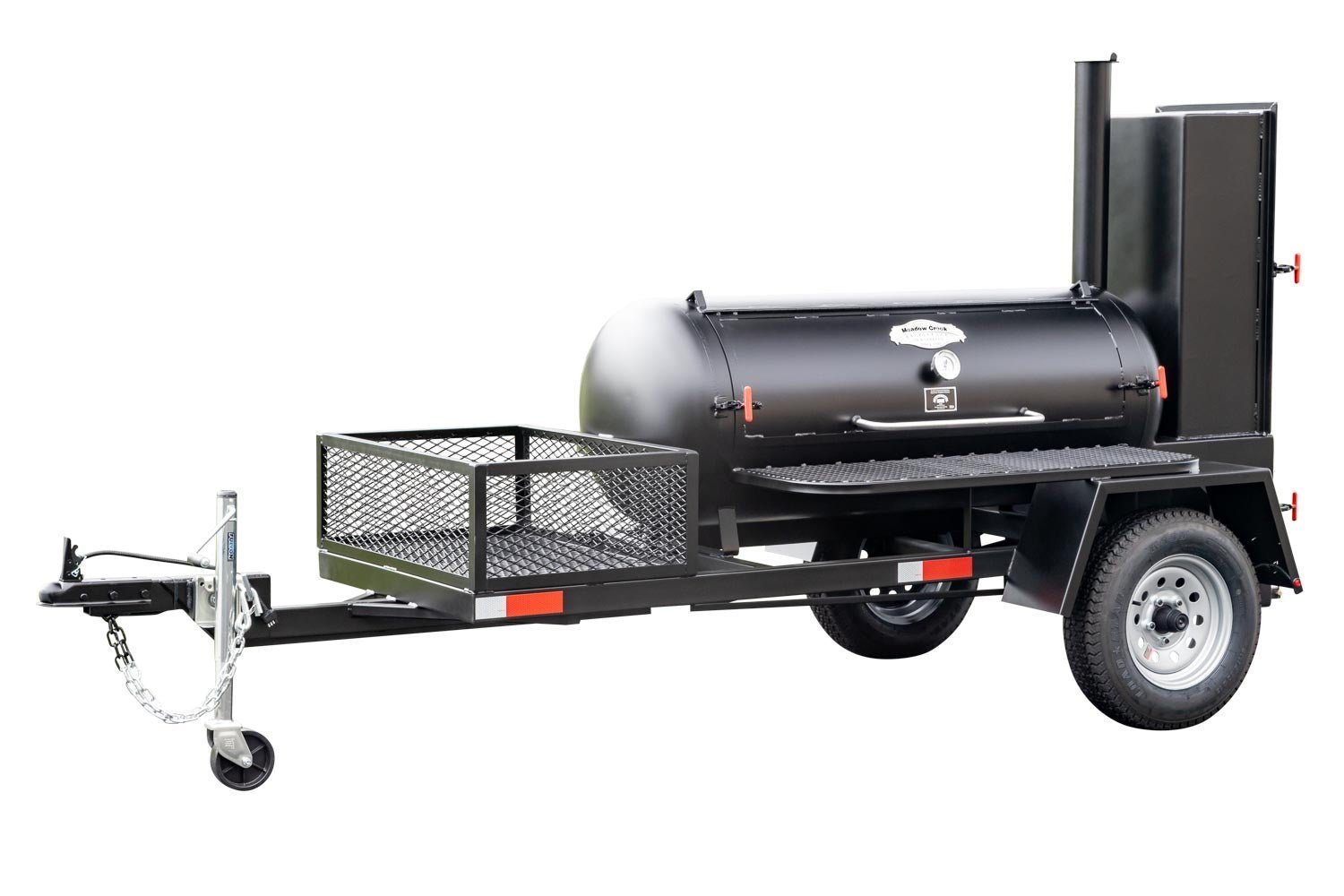 Close-up of the black steel firebox latch with textured handle and safety pin on Meadow Creek TS120 Offset BBQ Smoker Trailer