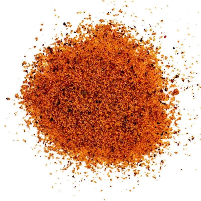 Close-up of Meat Church Gospel Rub 14oz jar lid with textured seasoning remnants and bold black label font detail