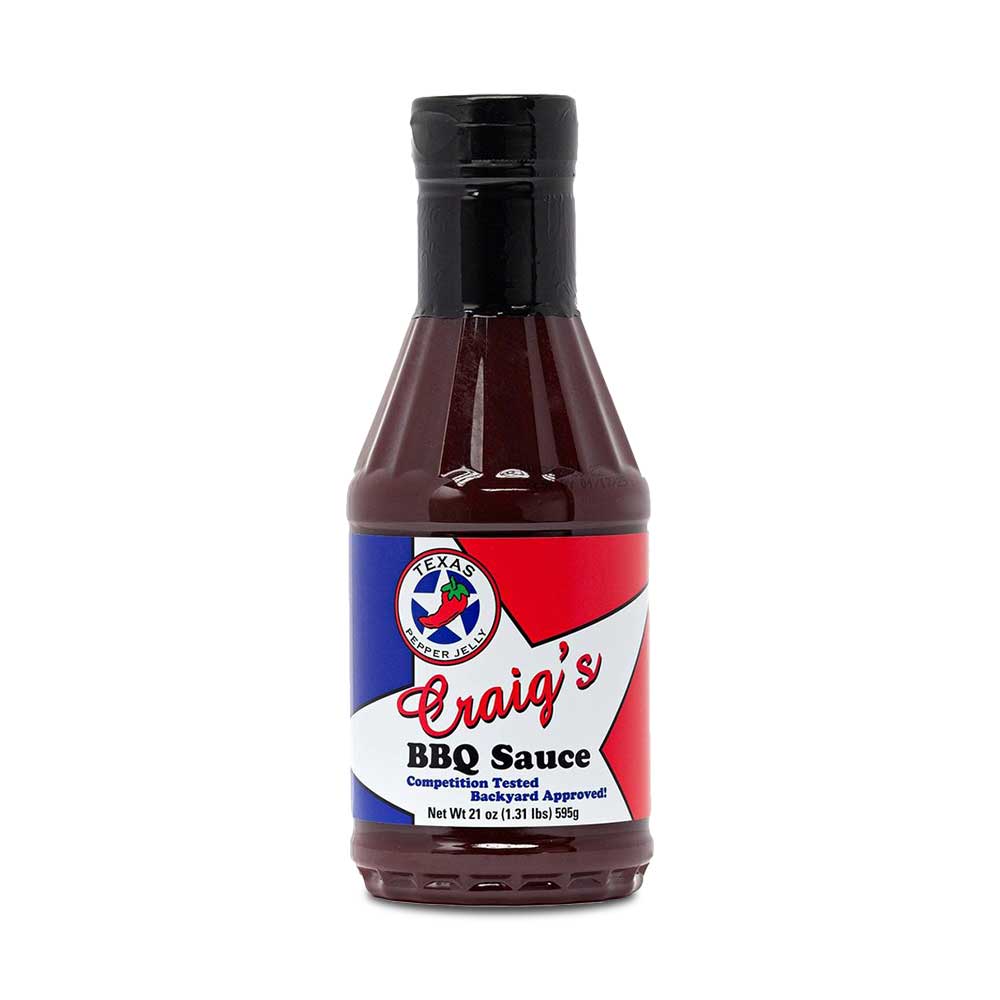 Texas Pepper Jelly Craig's BBQ Sauce 21oz bottle with rich red, glossy sauce for beef, pork, and poultry cooking